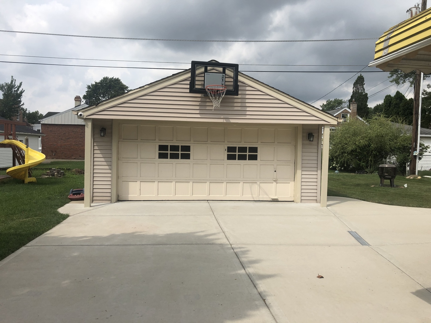 2436 2nd Avenue North Riverside, IL 60546 - Photo 22 of 26 a front view of a house with a yard and garage