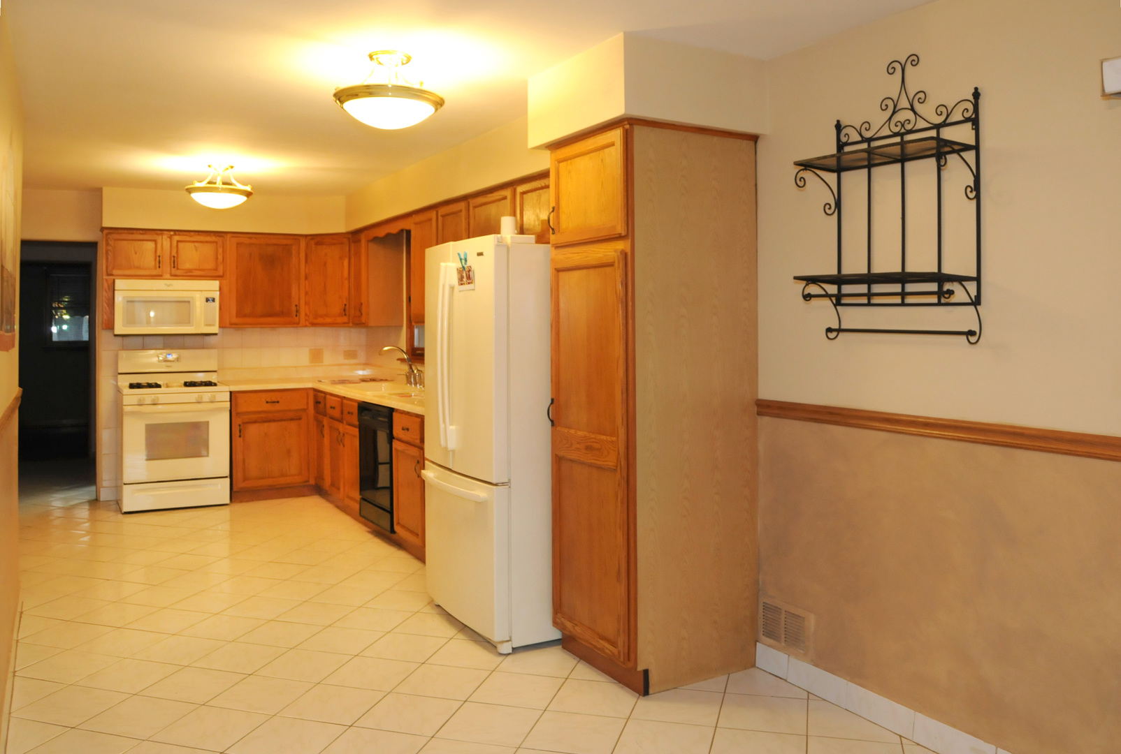 2436 2nd Avenue North Riverside, IL 60546 - Photo 5 of 26 a kitchen with stainless steel appliances a refrigerator sink and cabinets