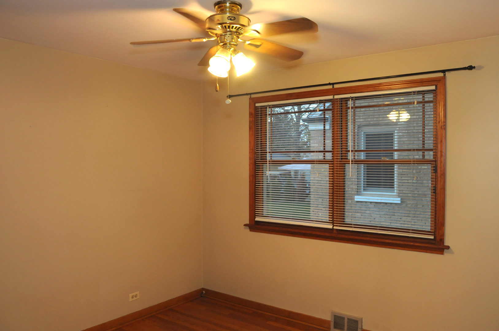 2436 2nd Avenue North Riverside, IL 60546 - Photo 7 of 26 a view of an empty room with window and wooden floor