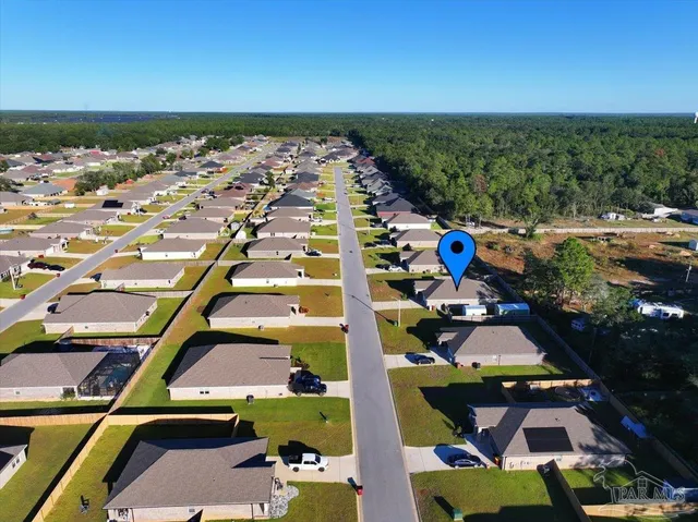 an aerial view of multiple house