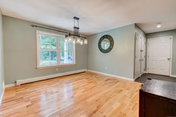 a kitchen with stainless steel appliances a sink stove and refrigerator