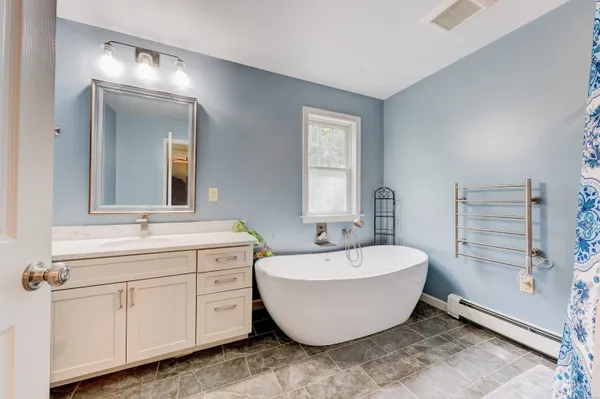 a view of a storage & utility room with washer and dryer