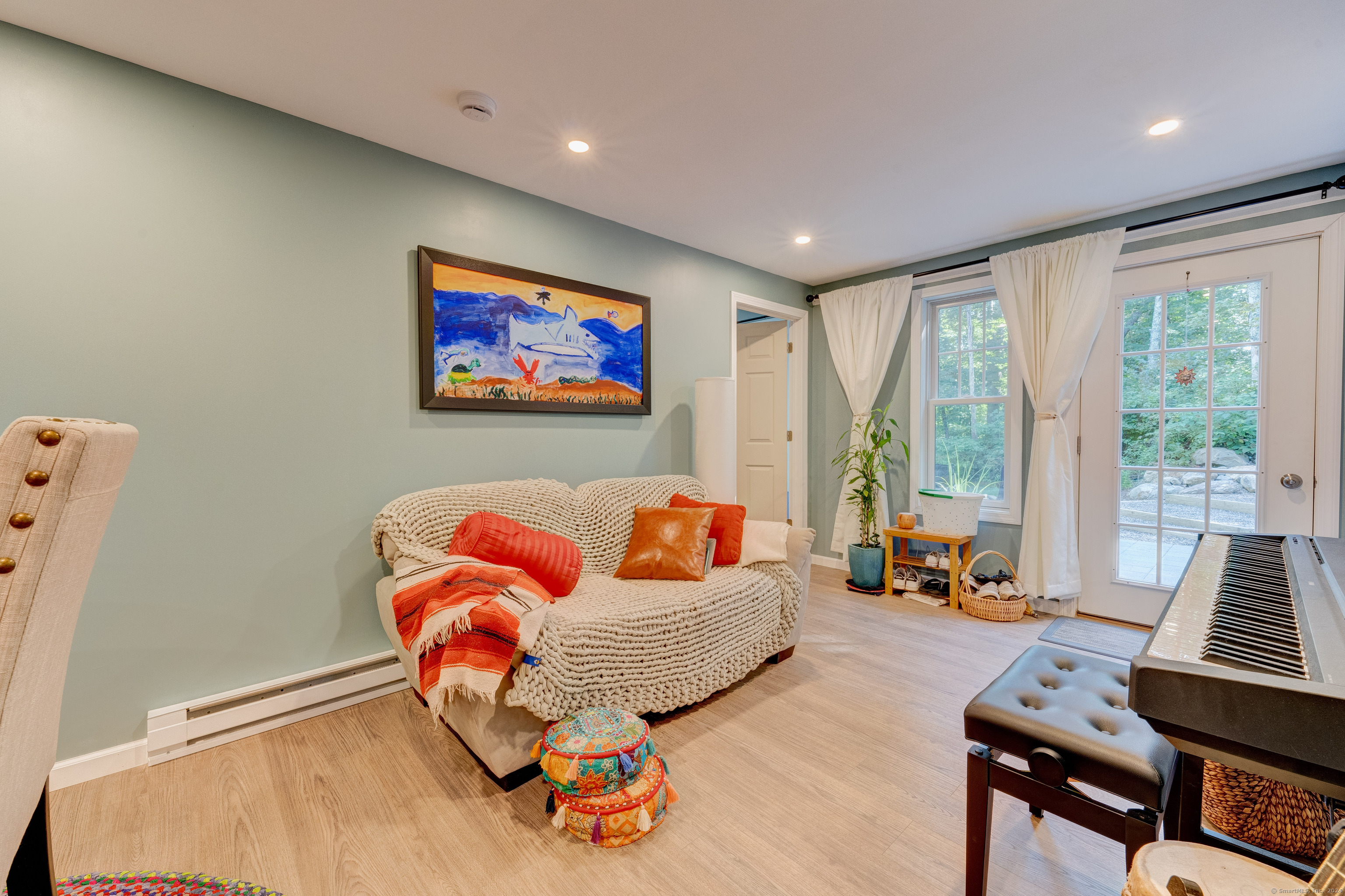 404 Bassetts Bridge Road Mansfield, CT 06250 - Photo 36 of 40 lower level living room