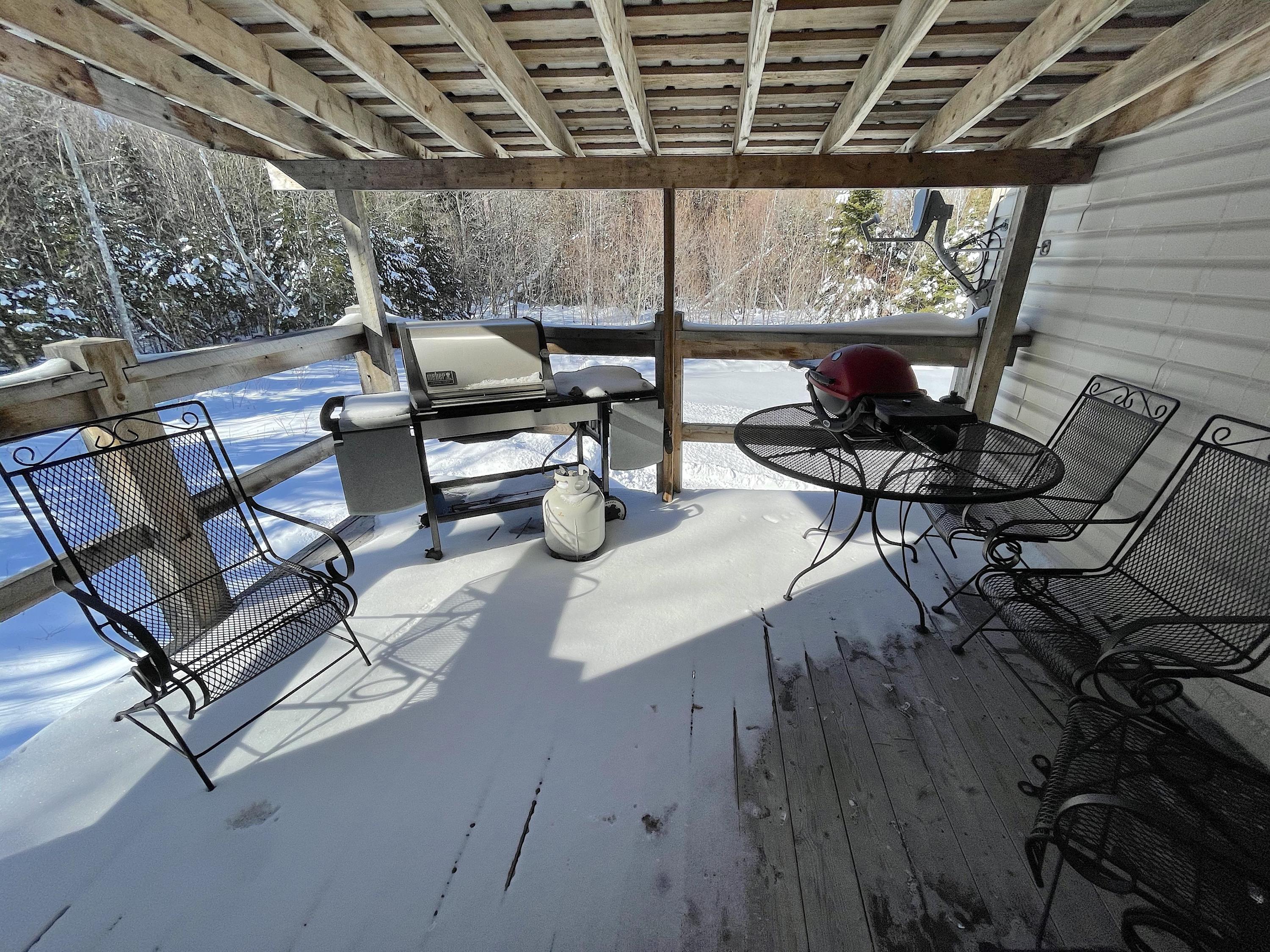 519 W Road Portage Lake, ME 04768 - Photo 15 of 27 Level 2 Covered Deck