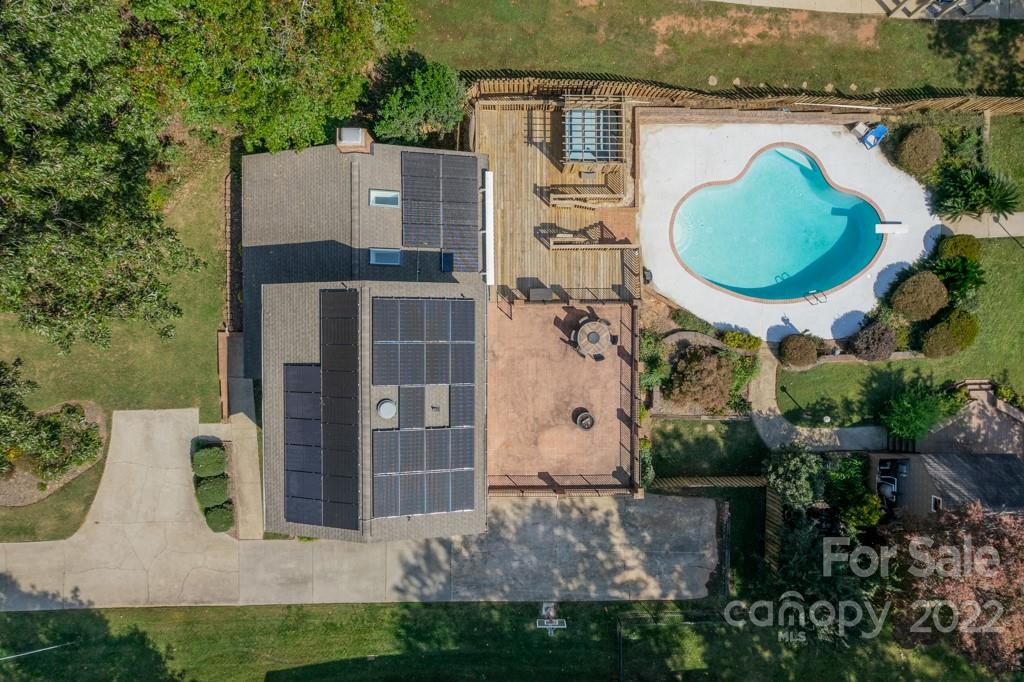 4286 Lake Shore Road North Denver, NC 28037 - Photo 48 of 48 an aerial view of a house with a swimming pool and garden view