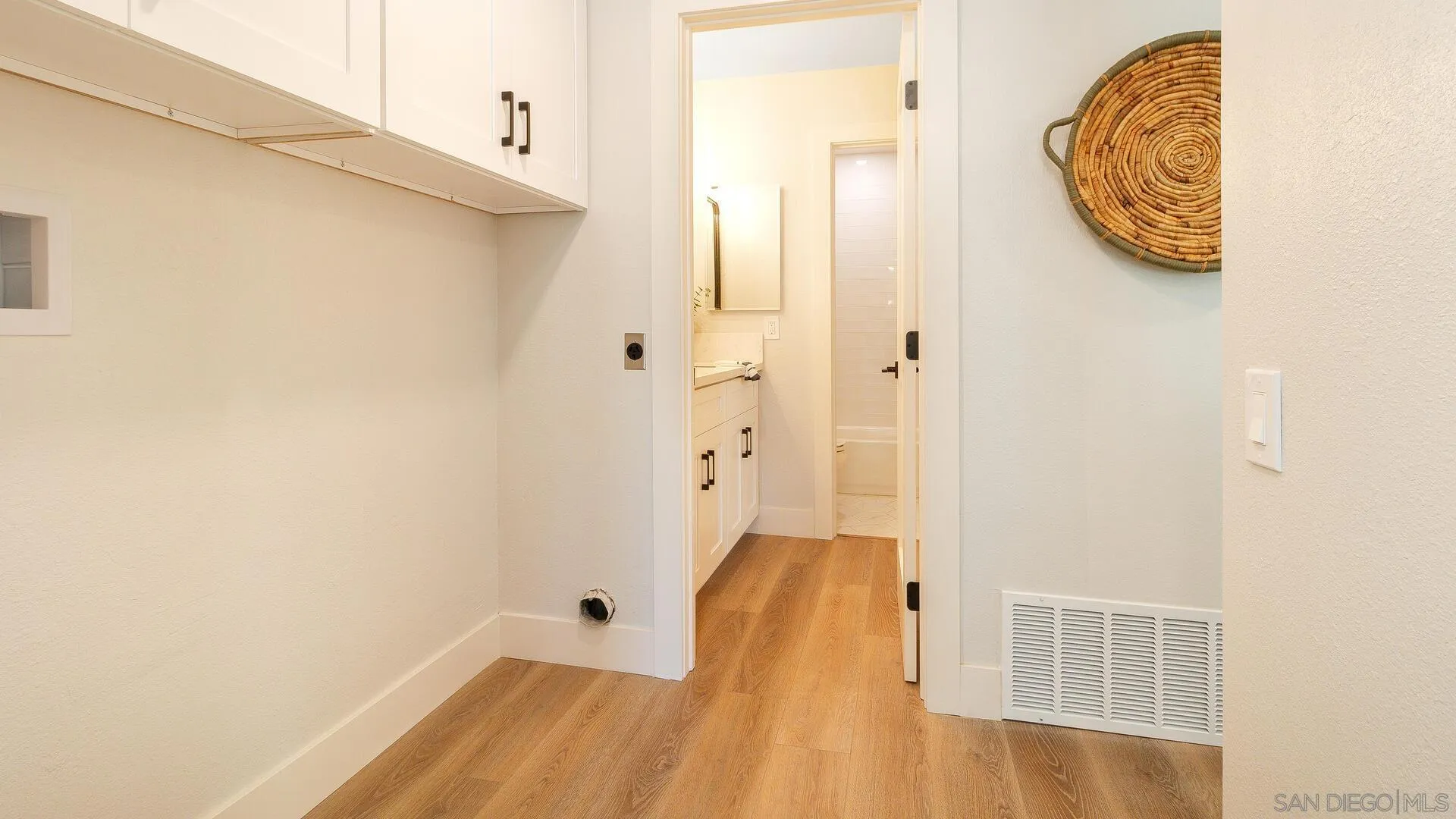 1371 Evergreen Drive Cardiff, CA 92007 - Photo 21 of 25 a view of a room with wooden floor and small space