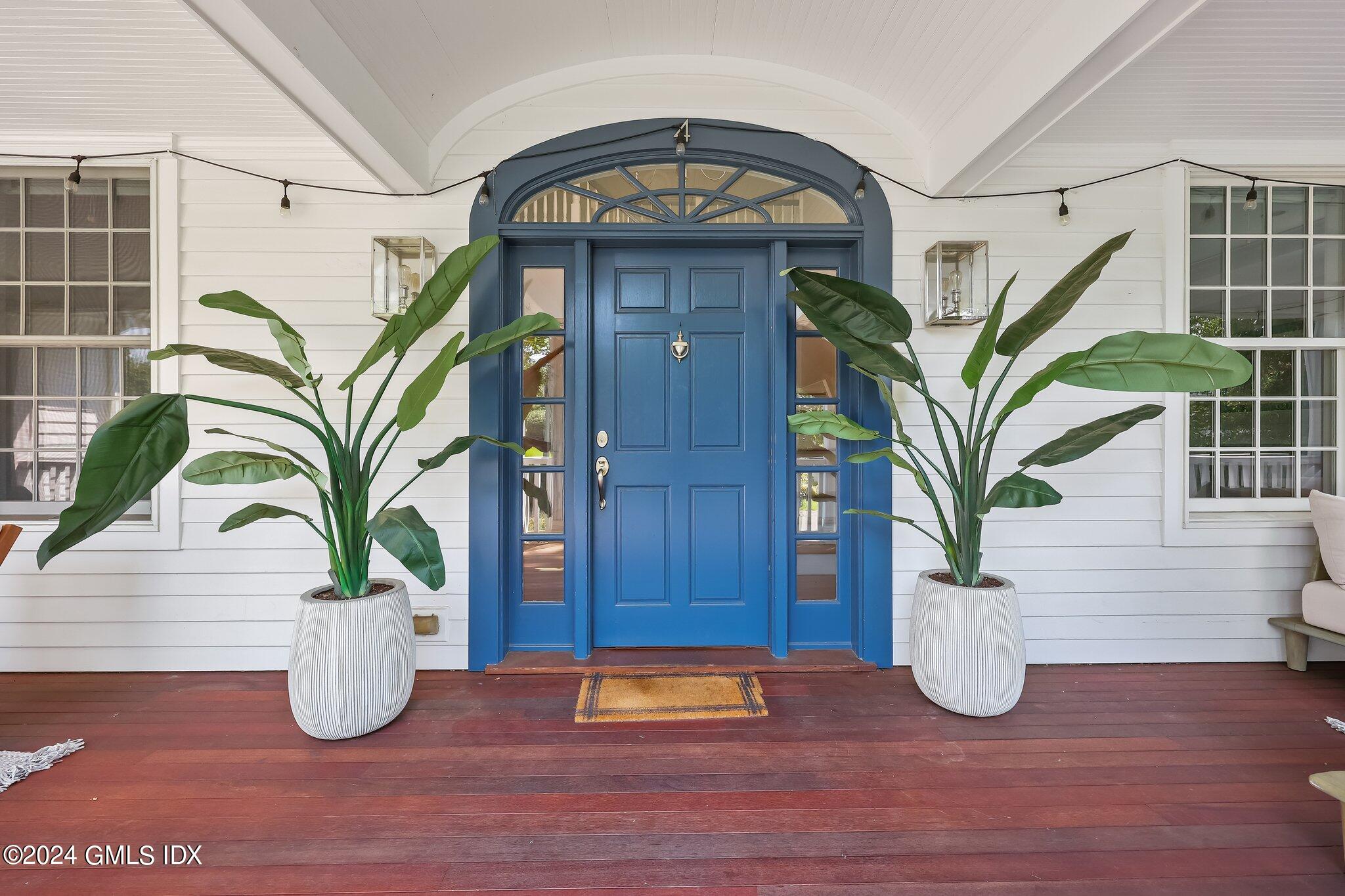 4 Grimes Road Old Greenwich, CT 06870 - Photo 2 of 22 a view of entryway with wooden floor