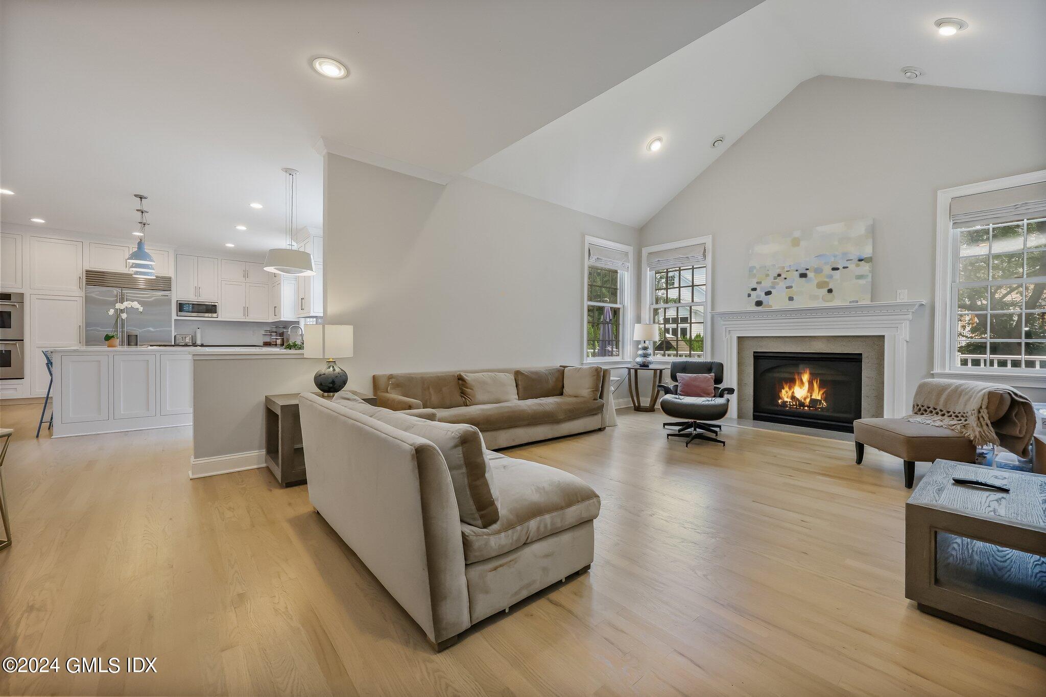 4 Grimes Road Old Greenwich, CT 06870 - Photo 6 of 22 a living room with furniture and a fireplace