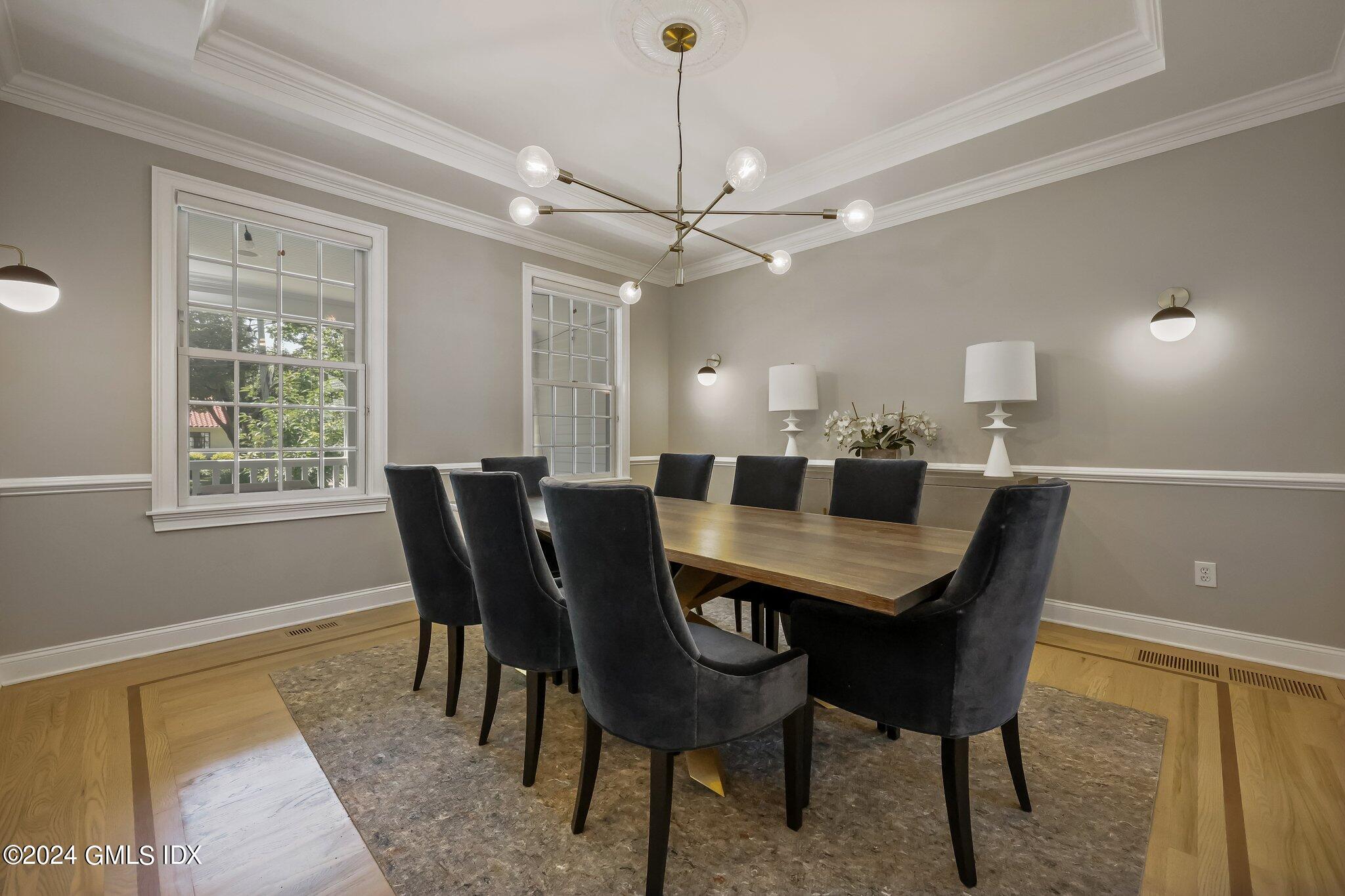 4 Grimes Road Old Greenwich, CT 06870 - Photo 8 of 22 a view of a dining room with furniture window and wooden floor