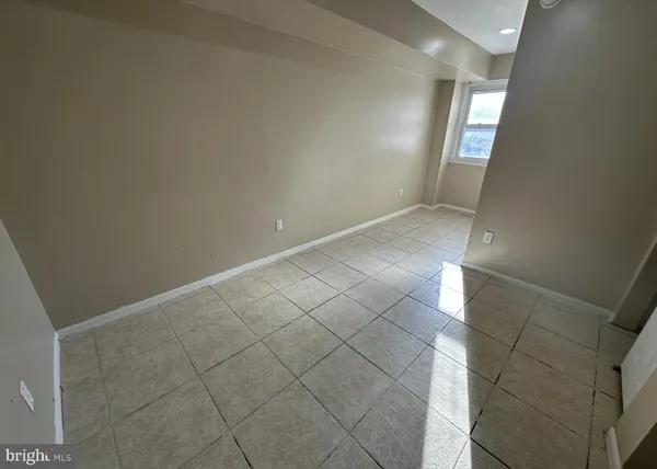 a view of a utility room with a fireplace