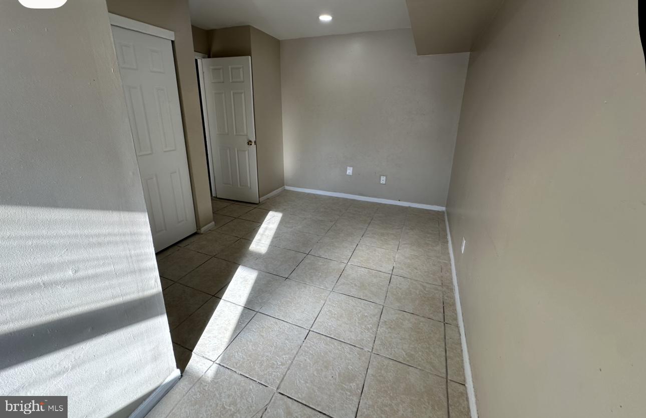 4430 Solly Avenue, Unit 2 Philadelphia, PA 19136 - Photo 10 of 13 a view of a utility room with a fireplace