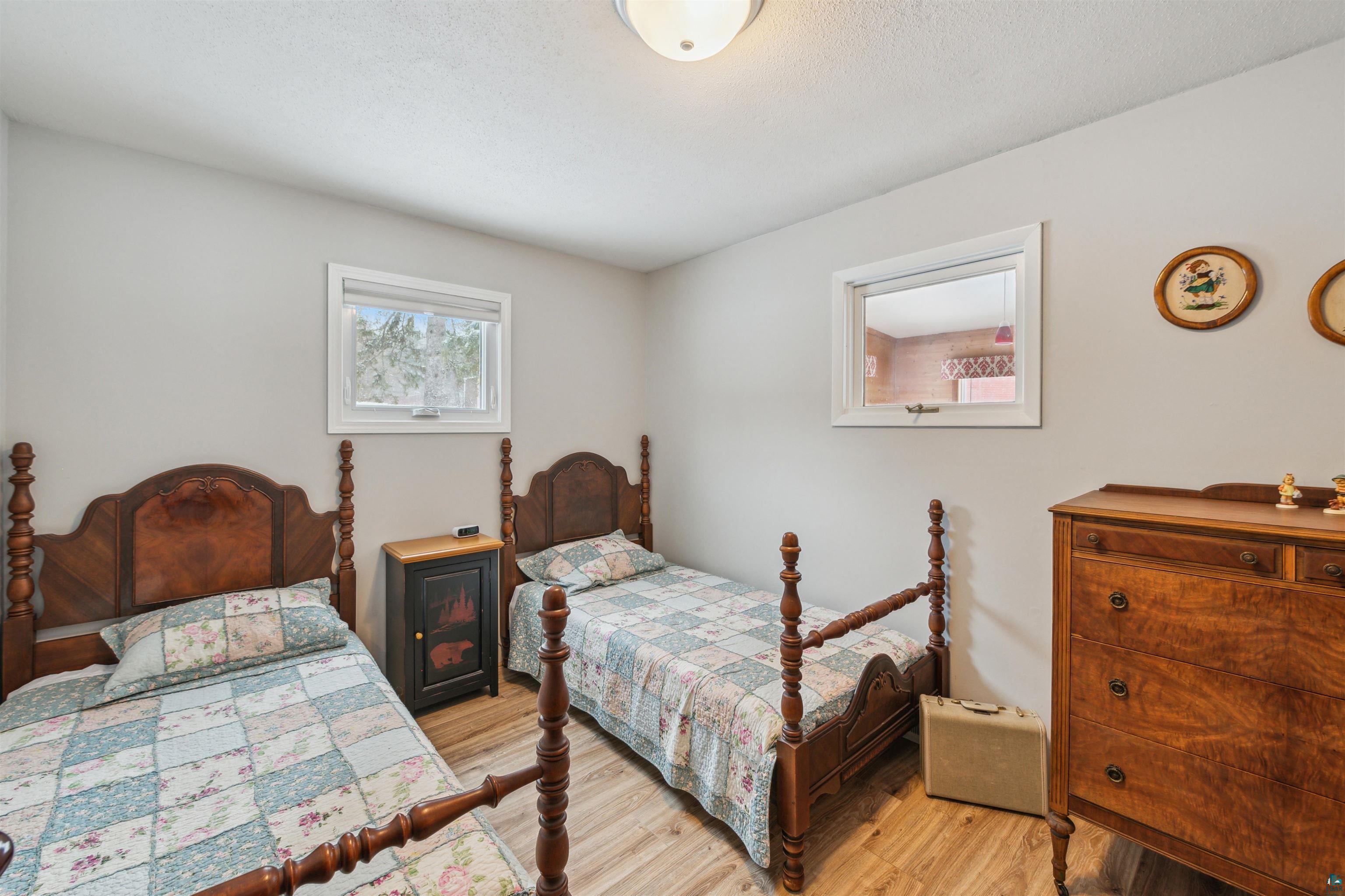 7212 County Road East South Range, WI 54874 - Photo 16 of 34 Soothing colors in this 12' x 9' bedroom.