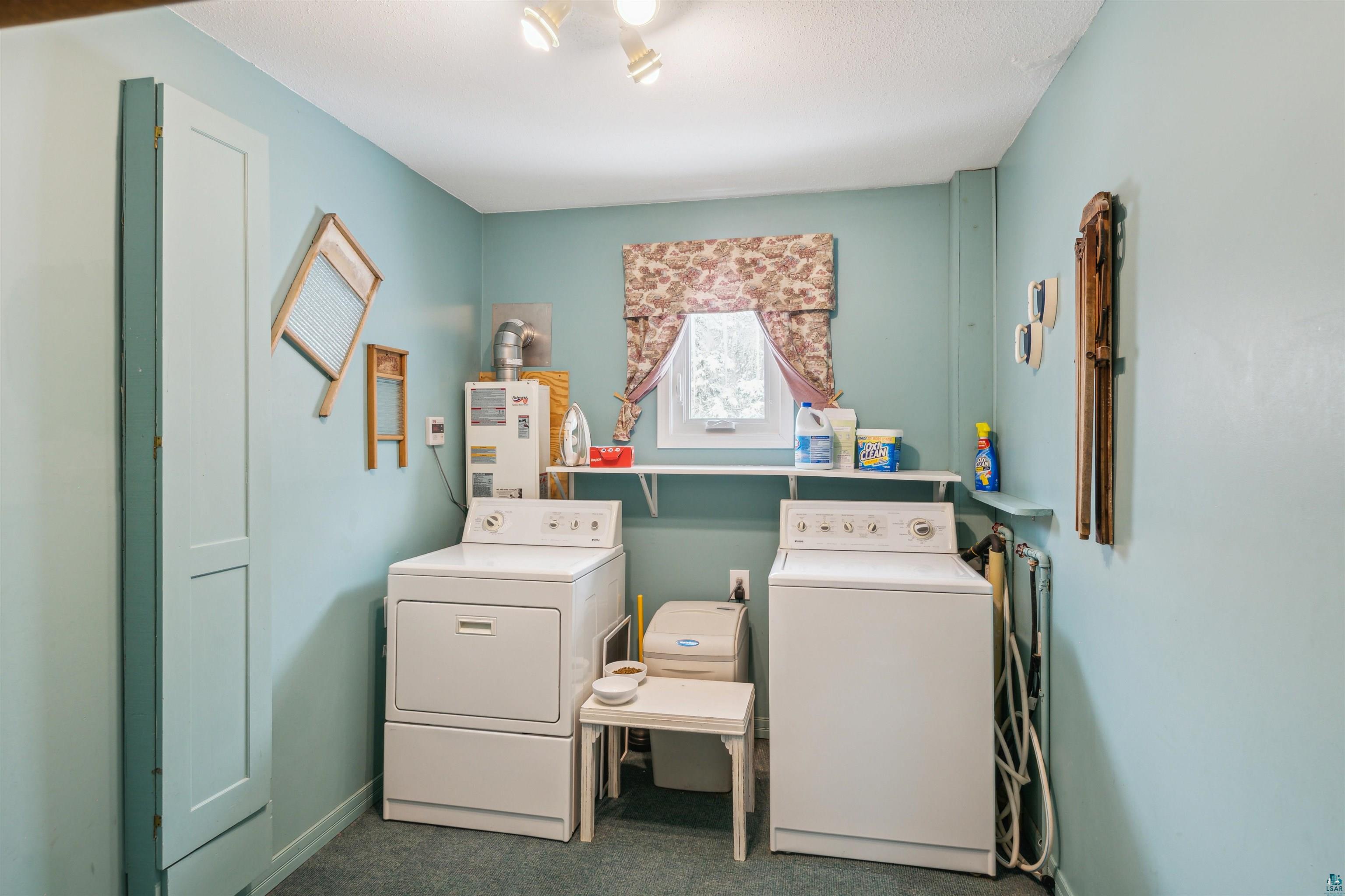 7212 County Road East South Range, WI 54874 - Photo 20 of 34 0'x7" room accommodates all laundry needs and has storage area as a bonus!