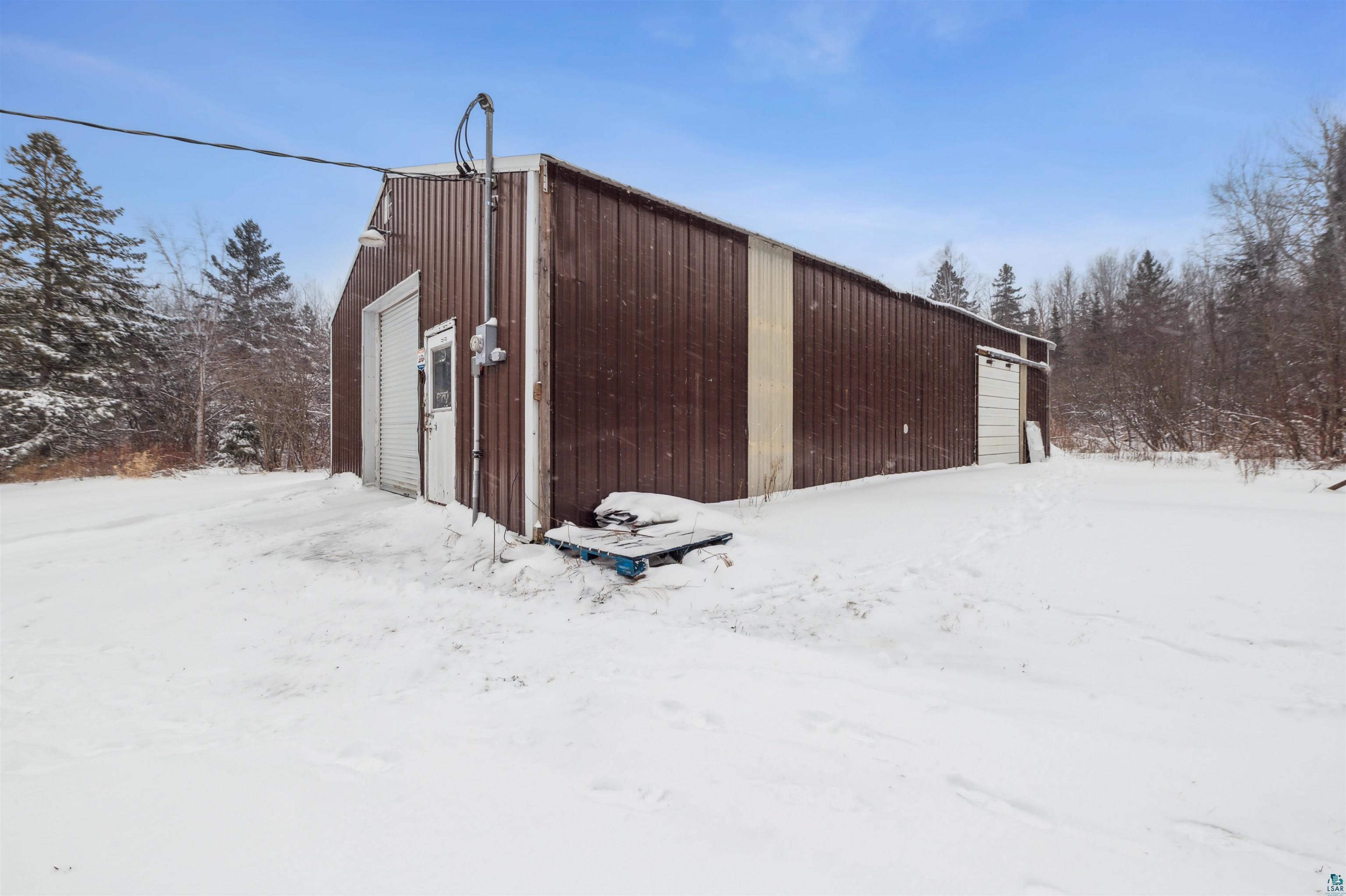 7212 County Road East South Range, WI 54874 - Photo 23 of 34 Snow covered structure with an outdoor structure