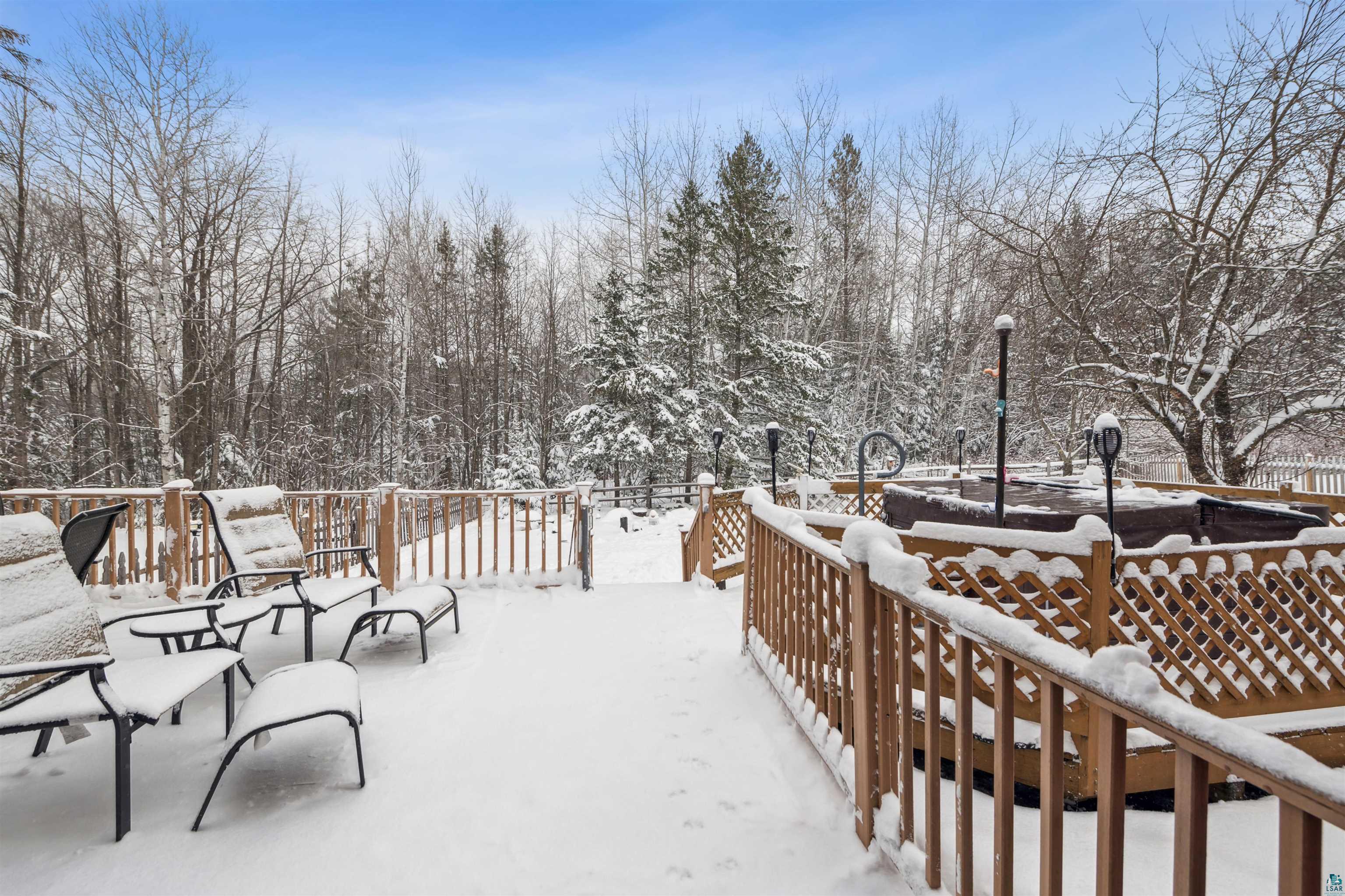 7212 County Road East South Range, WI 54874 - Photo 25 of 34 Deck off of kitchen/dining room for morning coffee, griliing, or lunch in your hot tub!