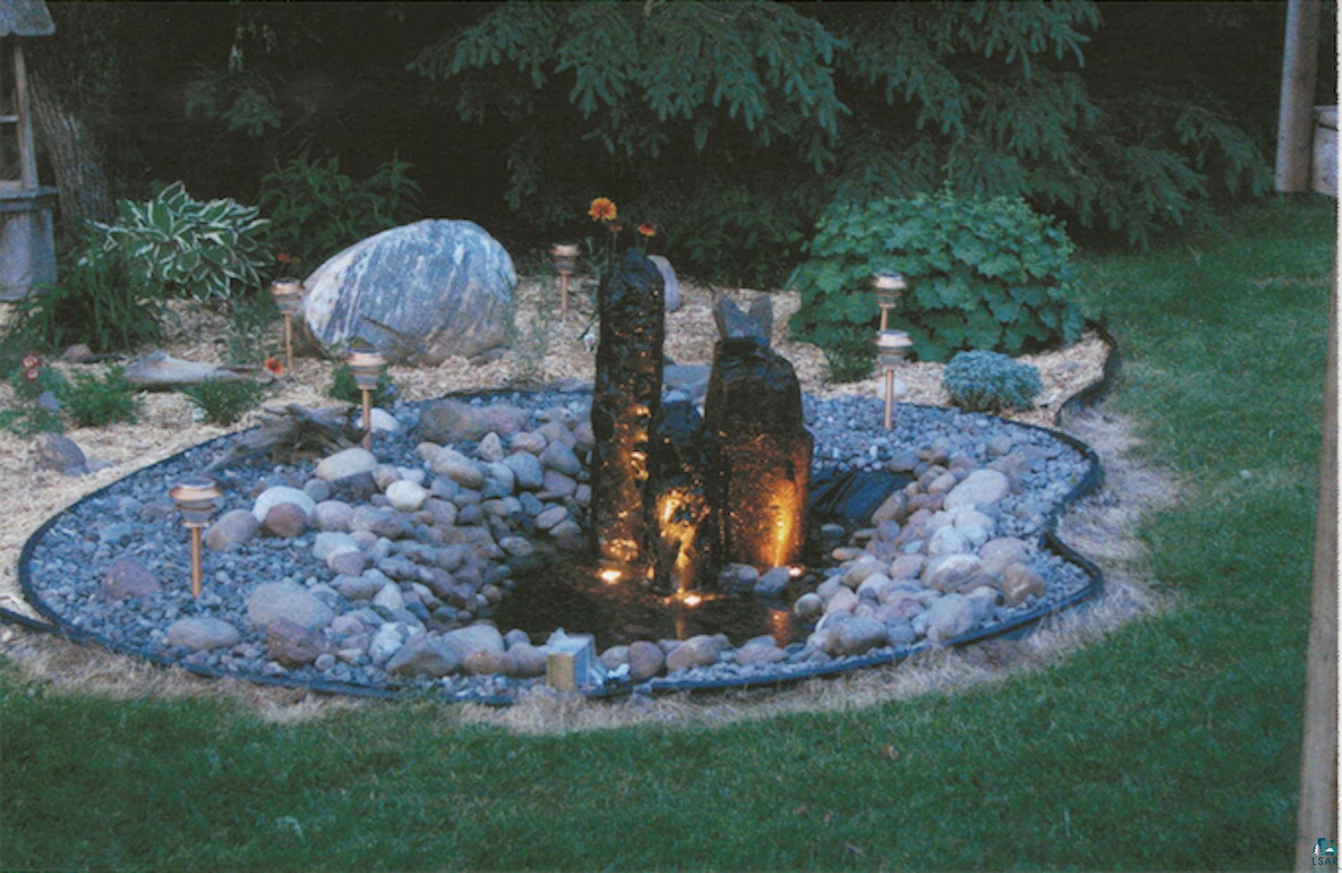 7212 County Road East South Range, WI 54874 - Photo 26 of 34 When spring/summer comes, the backyard is a destination.