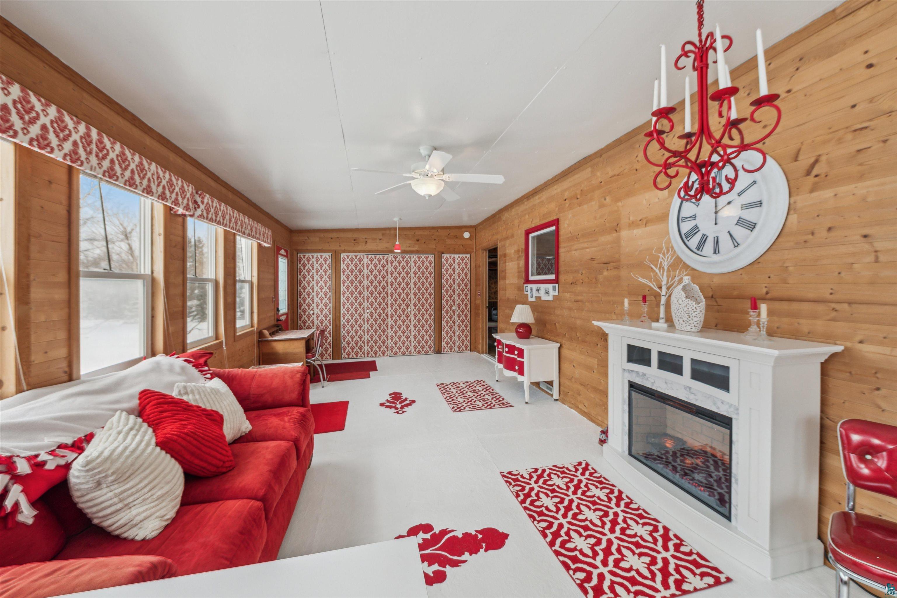 7212 County Road East South Range, WI 54874 - Photo 6 of 34 Cozy fireplace and whimsical decor will make this a favorite space.