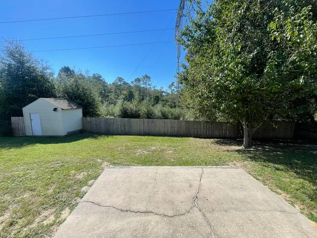 a view of outdoor space and yard