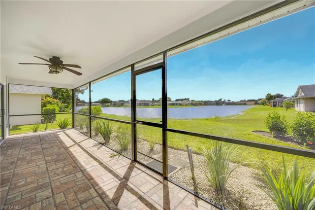 a view of swimming pool with seating space