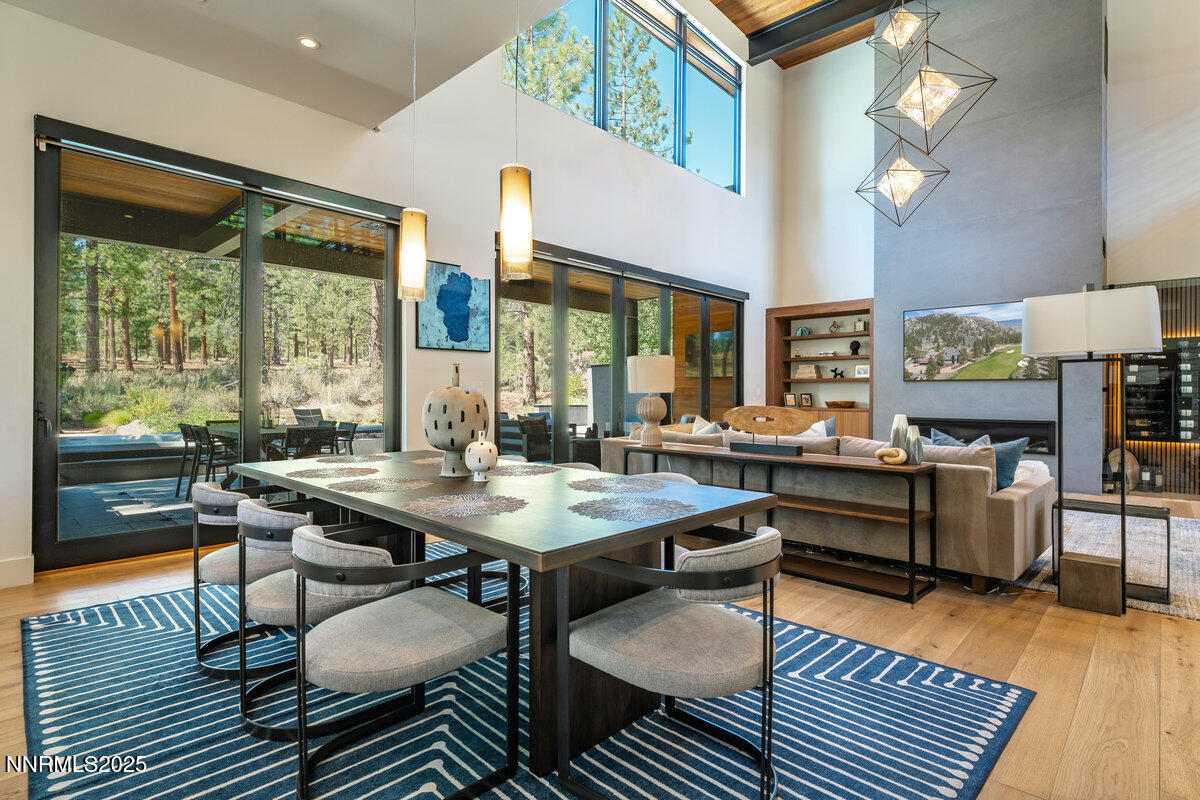 181 Redding Way Carson City, NV 89705 - Photo 10 of 40 a view of a dining room with furniture window and wooden floor