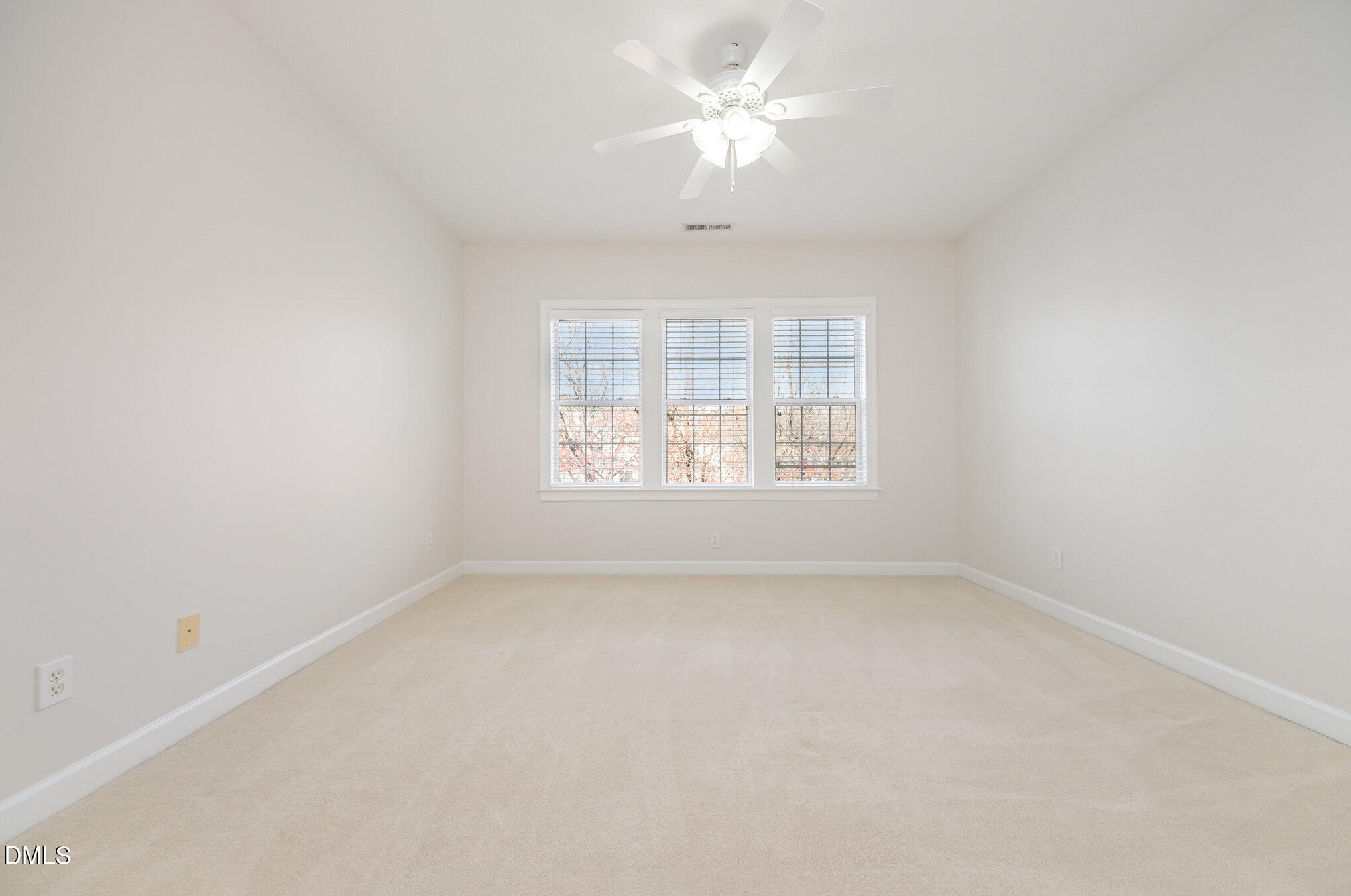 3912 Stags Leap Circle, Unit 27 Raleigh, NC 27612 - Photo 14 of 28 an empty room with a window