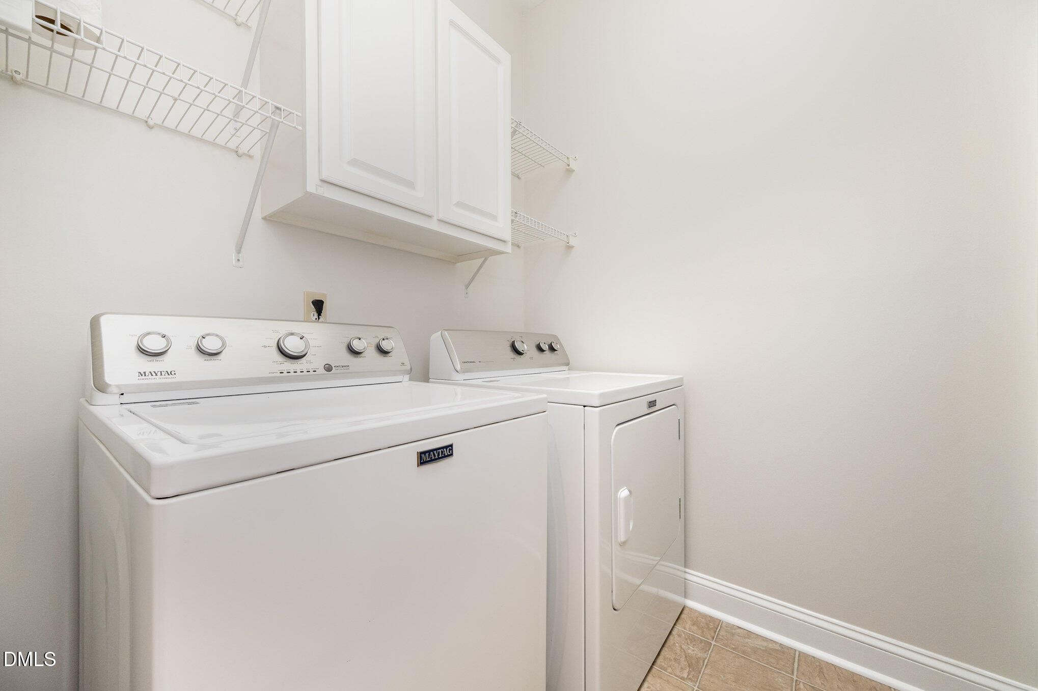 3912 Stags Leap Circle, Unit 27 Raleigh, NC 27612 - Photo 19 of 28 a utility room with dryer and washer