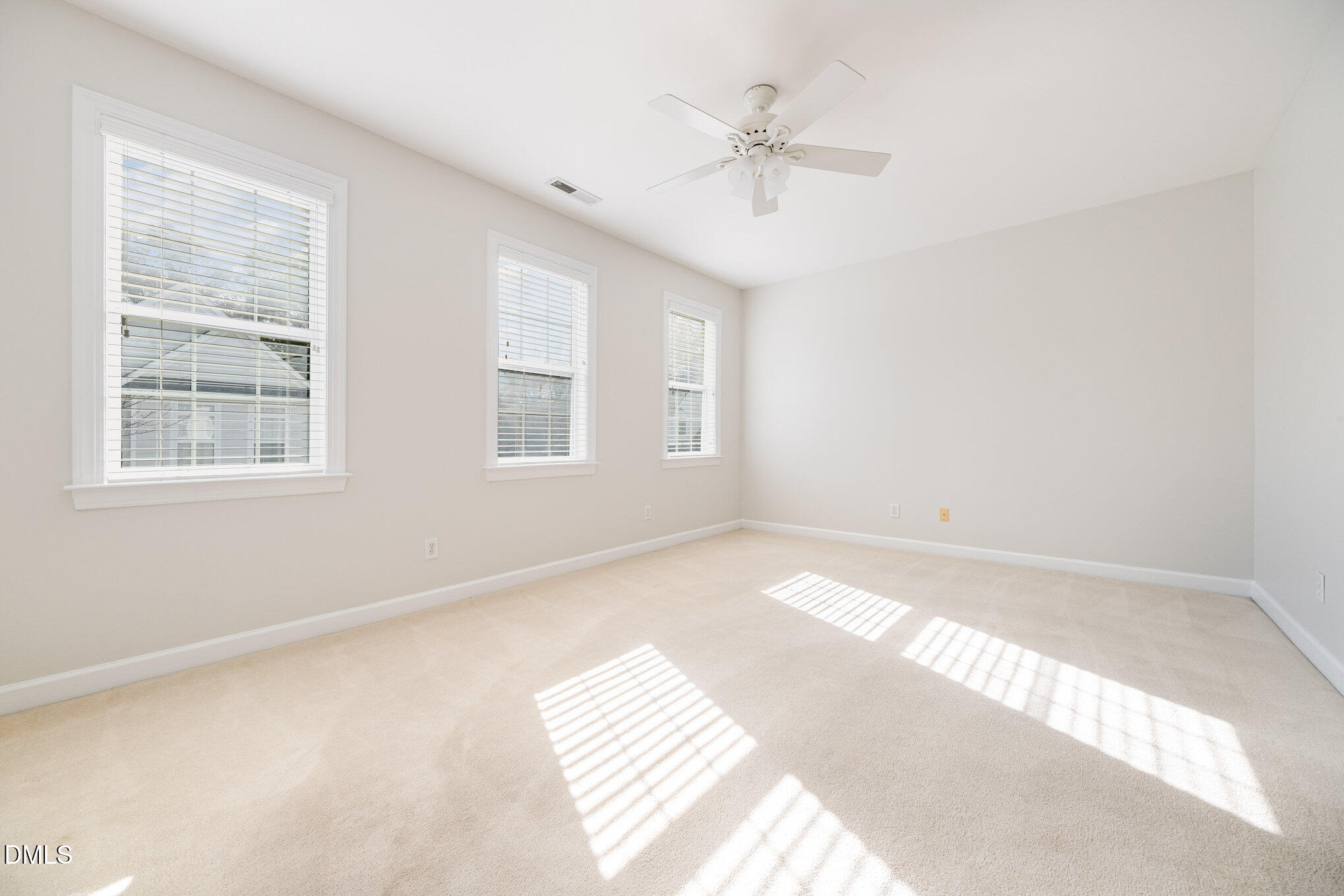 3912 Stags Leap Circle, Unit 27 Raleigh, NC 27612 - Photo 10 of 28 a view of an empty room with a window