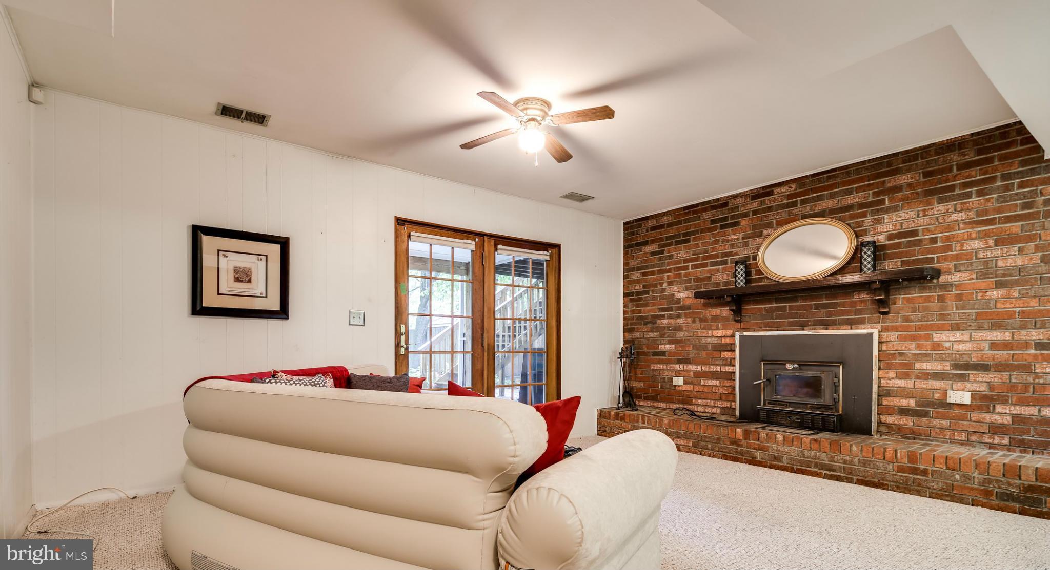 491 North Patuxent Road Odenton, MD 21113 - Photo 24 of 28 Wood burning fireplace add to this homes charm!