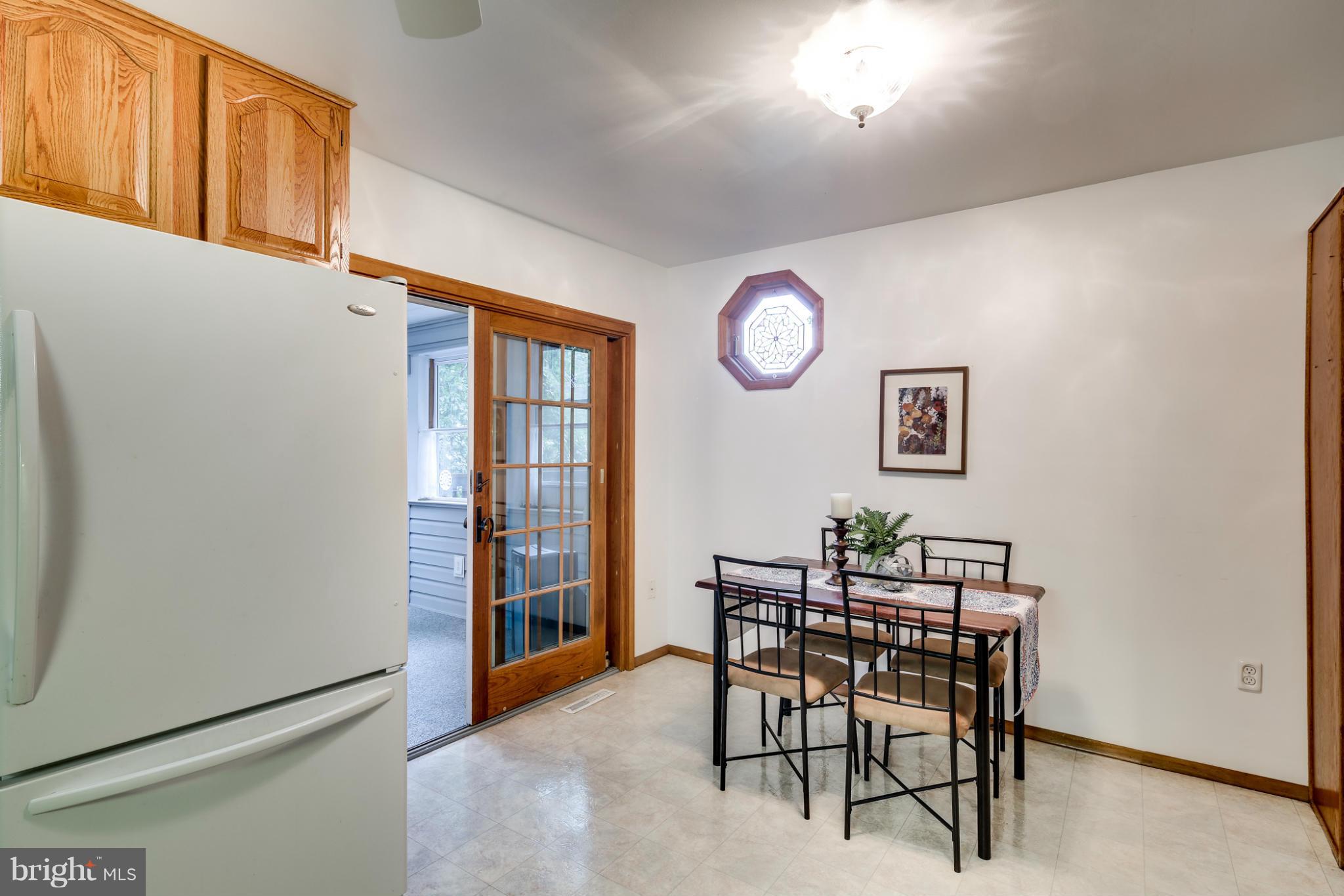 491 North Patuxent Road Odenton, MD 21113 - Photo 5 of 28 Kitchen leads out the the huge Sun Room.