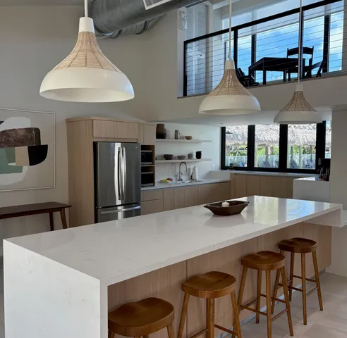 an aerial view of a houses with yard