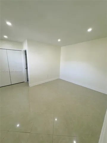 an empty room with a natural light