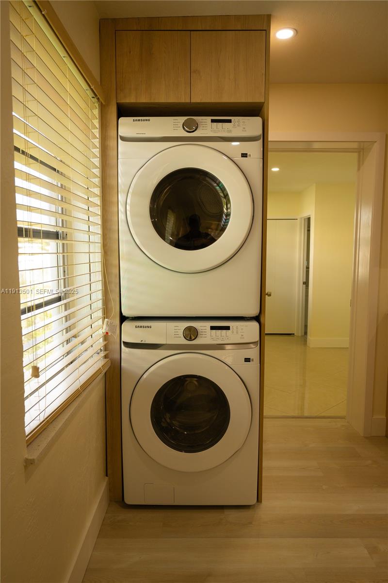 467 Southeast 3rd Street, Unit 1 Hialeah, FL 33010 - Photo 6 of 17 a utility room with dryer and washer