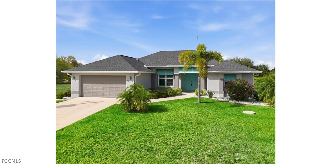 12 Idle Court Placida, FL 33946 - Photo 1 of 41 a front view of a house with a yard