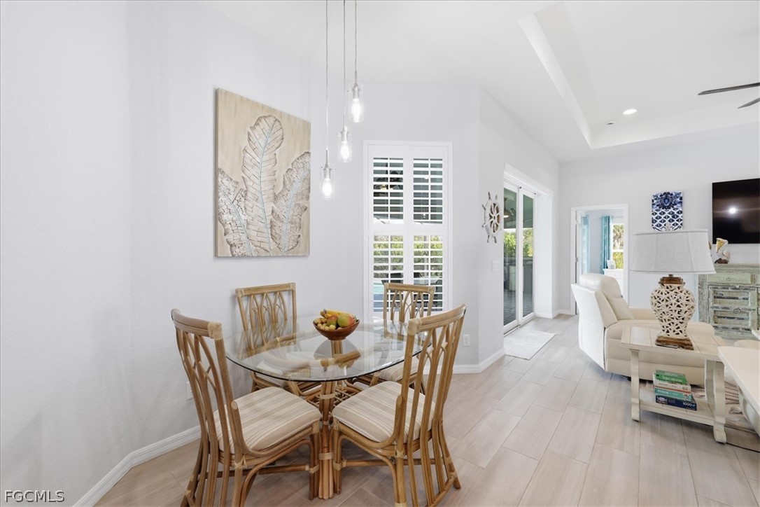12 Idle Court Placida, FL 33946 - Photo 13 of 41 a view of a dining room with furniture and a window