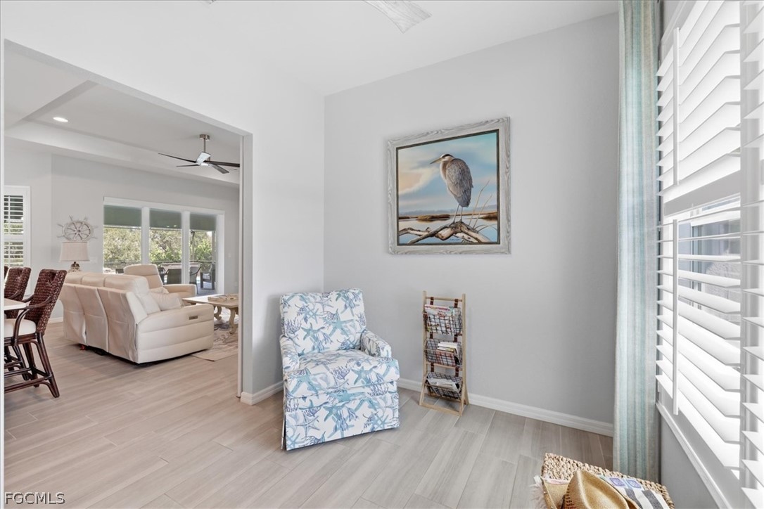 12 Idle Court Placida, FL 33946 - Photo 15 of 41 a living room with furniture and a large window with wooden floor