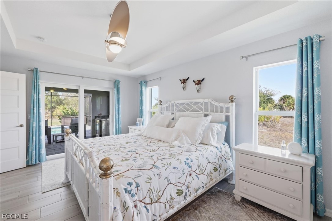 12 Idle Court Placida, FL 33946 - Photo 17 of 41 a bedroom with a large bed and a window