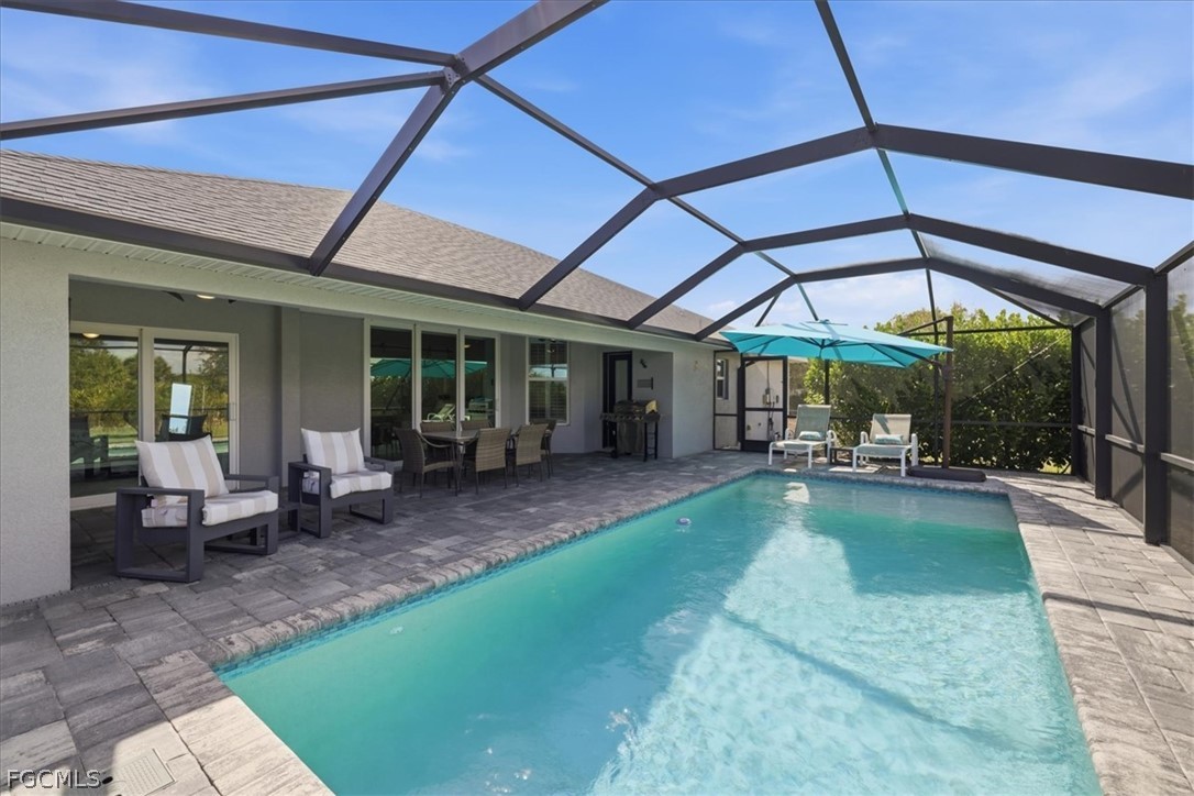 12 Idle Court Placida, FL 33946 - Photo 32 of 41 a view of a swimming pool with a patio