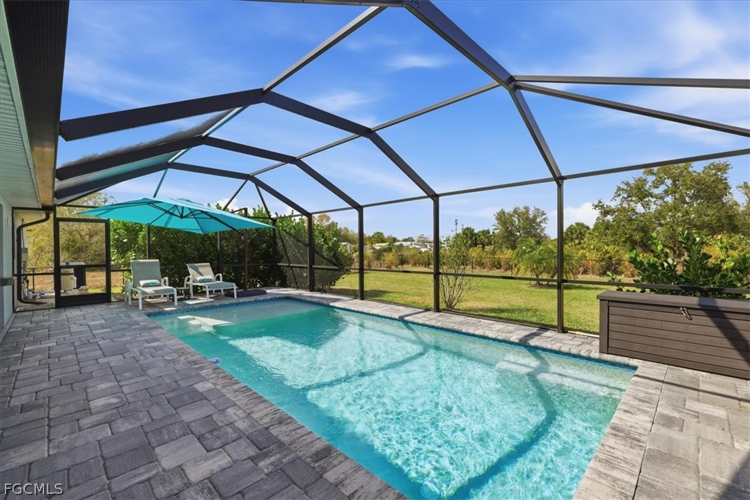 12 Idle Court Placida, FL 33946 - Photo 33 of 41 a view of a backyard with sitting area