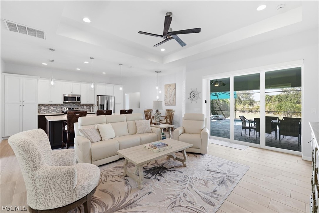 12 Idle Court Placida, FL 33946 - Photo 5 of 41 a living room with furniture and a large window