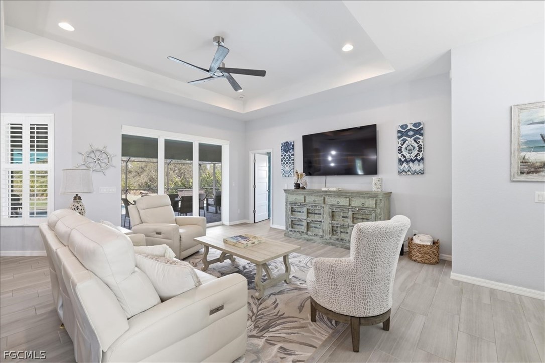 12 Idle Court Placida, FL 33946 - Photo 6 of 41 a living room with furniture and a flat screen tv