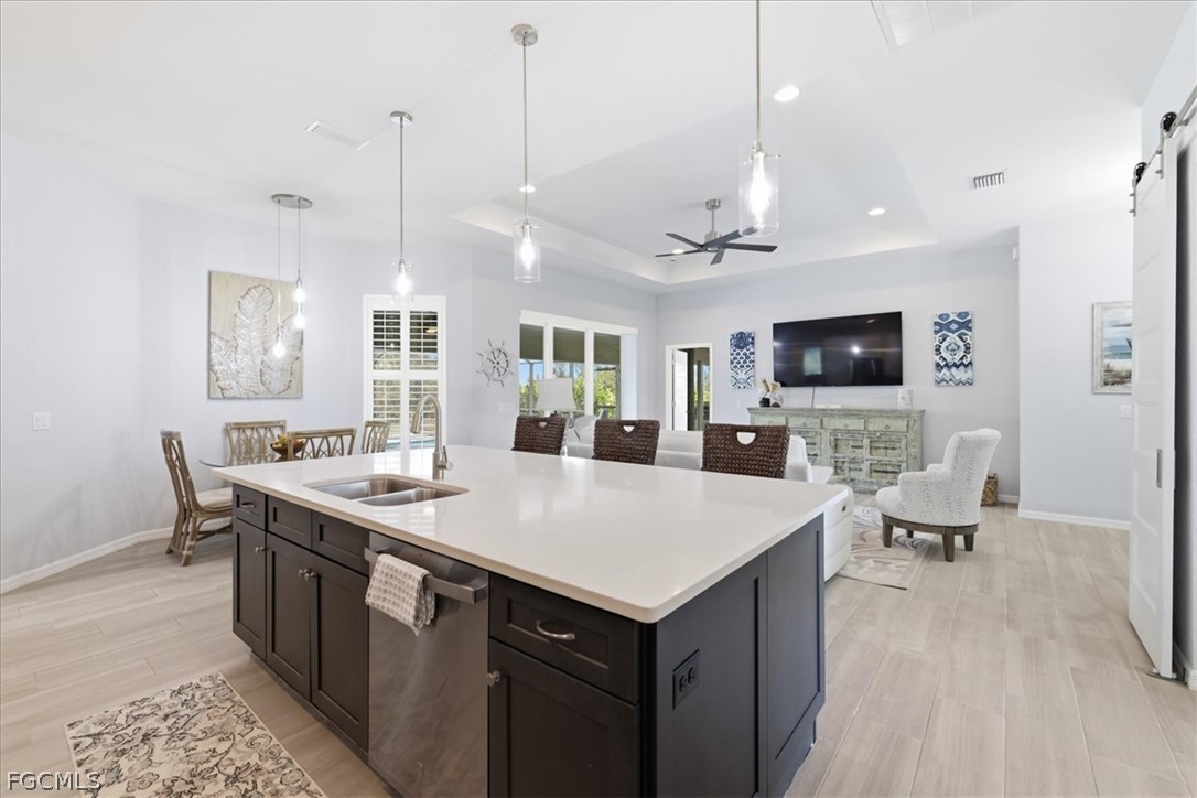 12 Idle Court Placida, FL 33946 - Photo 10 of 41 a large kitchen with kitchen island a sink counter space and appliances