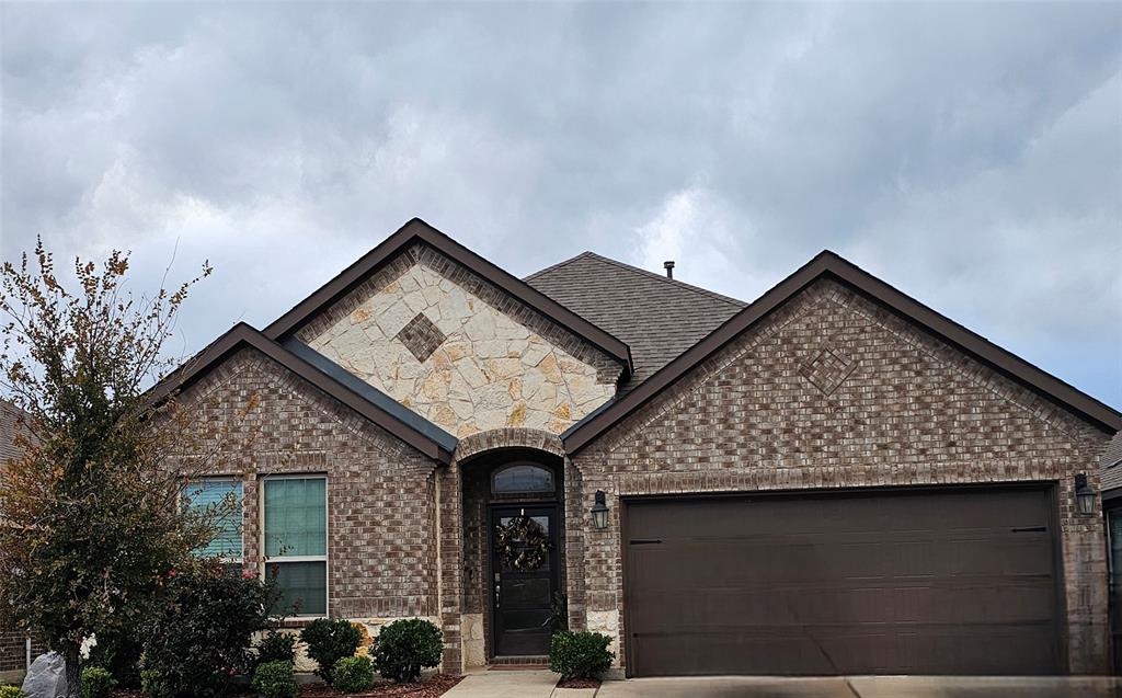 2813 Ainsworth Road Aubrey, TX 76227 - Photo 1 of 1 a front view of a house with garden