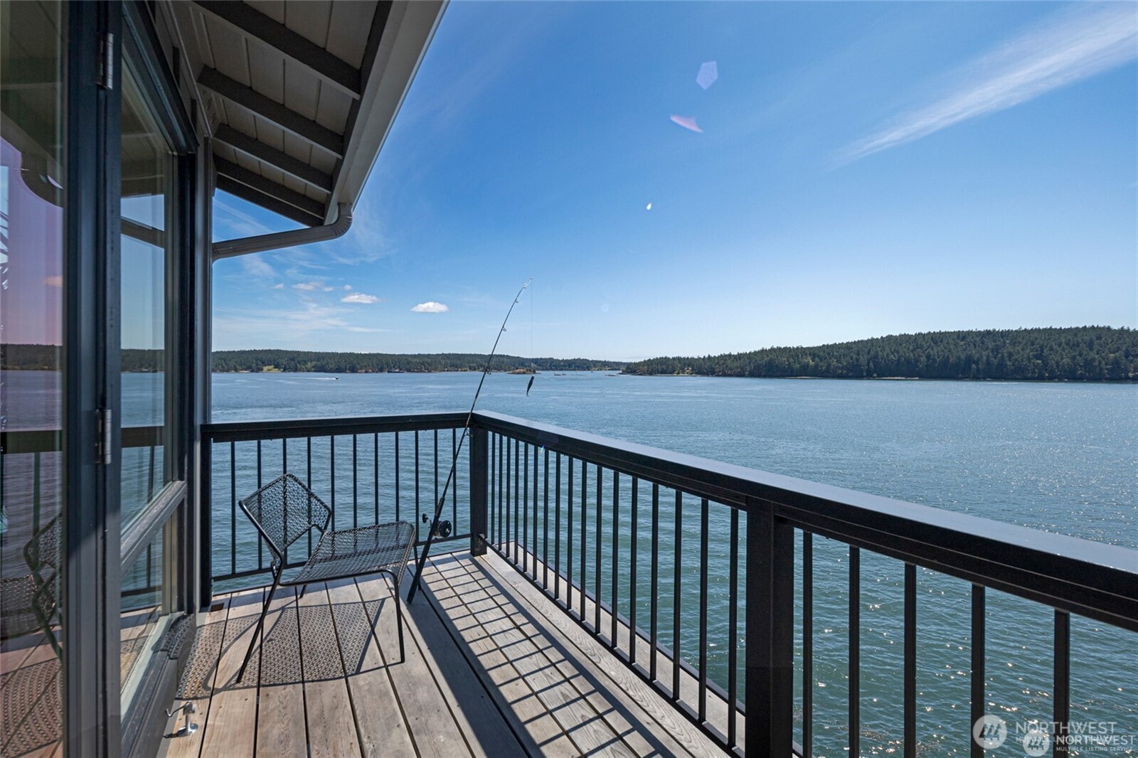 8256 Orcas Road Orcas Island, WA 98280 - Photo 11 of 20 a view of balcony with wooden floor and fence