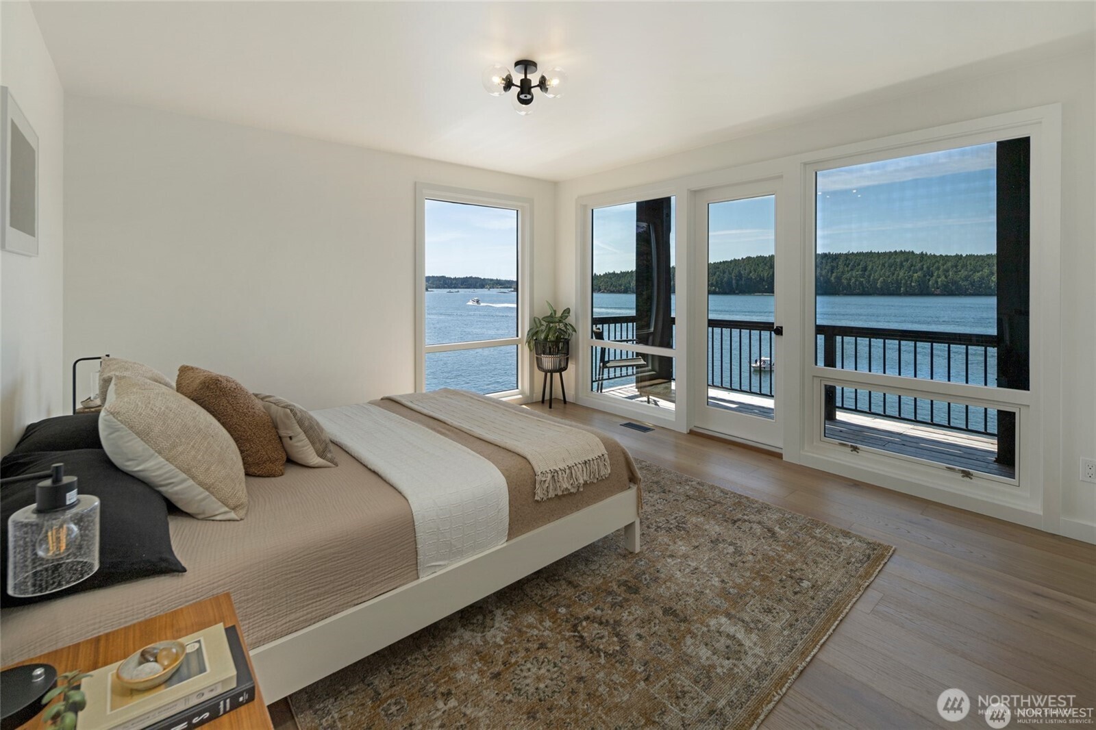 8256 Orcas Road Orcas Island, WA 98280 - Photo 16 of 20 a bedroom with bed and balcony