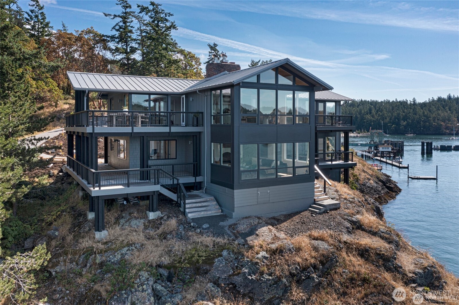 8256 Orcas Road Orcas Island, WA 98280 - Photo 3 of 20 a view of a house with a roof deck