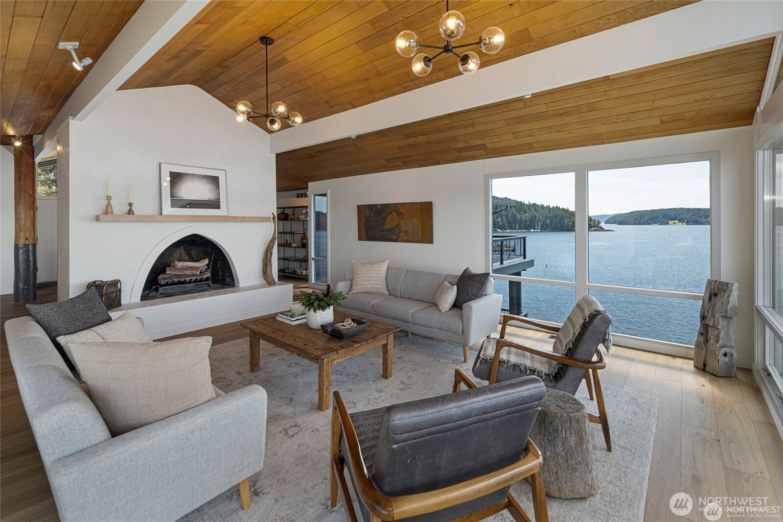 8256 Orcas Road Orcas Island, WA 98280 - Photo 5 of 20 a living room with furniture a ceiling fan and a rug