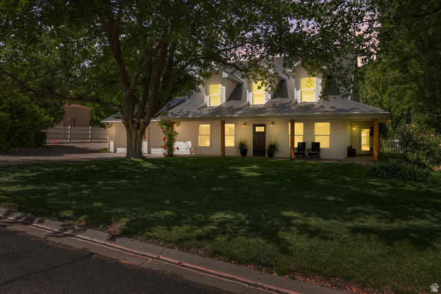 246 West Mount Charm Road Toquerville, UT 84774 - Photo 55 of 70 View of front of property featuring a porch, concrete driveway, and an attached garage