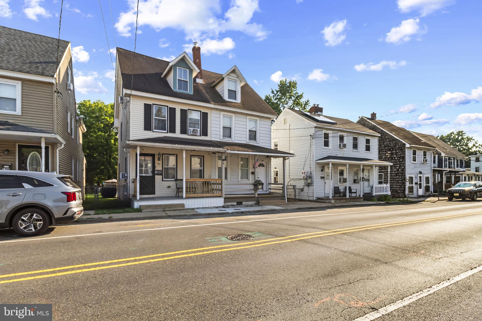 152 1/2 Rancocas Road Mount Holly, NJ 08060 - Photo 4 of 26 a front view of a building with street view