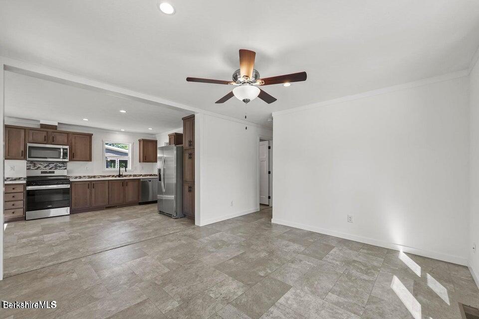 395 Cheshire Road, Unit 104 Pittsfield, MA 01201 - Photo 12 of 22 Living Rm to Kitchen