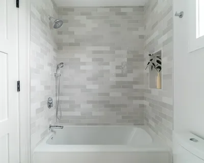 a close view of a bathtub in bathroom